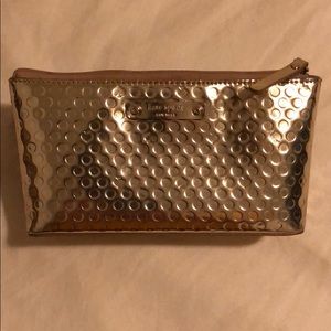Kate Spade reflective gold makeup bag
